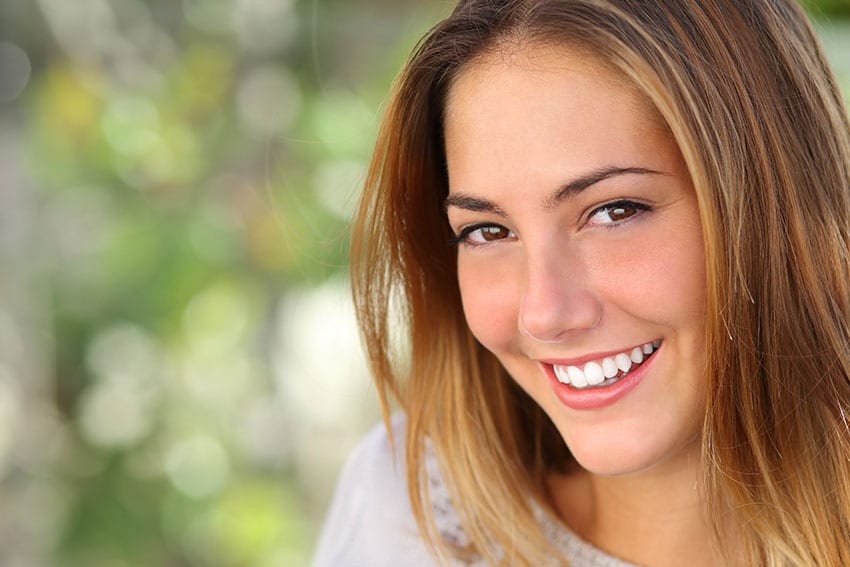 young woman enjoying the beautiful outdoors